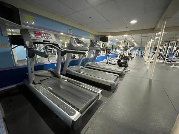 Fitness center cardio area with treadmills and ellipticals at Presque Isle Hotel