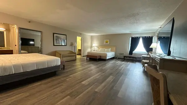 Double Queen Room with open floor plan at Presque Isle Hotel